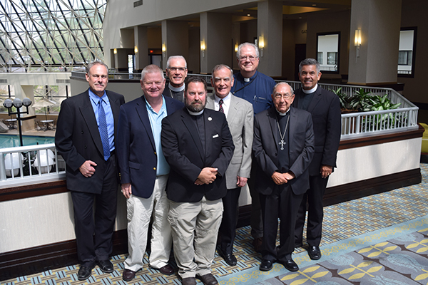 (Back Row Left to Right): Dr. Joel Lehenbauer (LCMS), Bishop John Bradosky (NALC), Rev. Larry Vogel (LCMS). (Front Row Left to Right): Rev. John Pless (LCMS), Dr. Albert Collver (LCMS), Rev. Mark Chavez (NALC), Rev. Paull Spring (NALC), Rev. David Wendel (NALC)