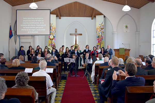 A choir performs during worship at St. Peter church in Buenos Aires.